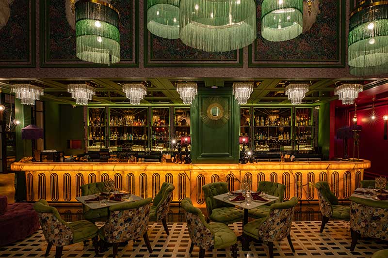 Romantic rainforest-themed fine dining restaurant in Mumbai BKC with lush greenery and ambient lighting at Amazonia